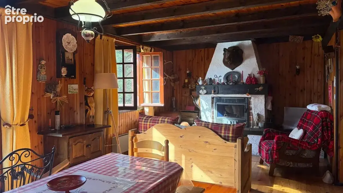 Chalet en bois avec terrasse plein sud et grand terrain arboré de 2 680 m² - photo 6