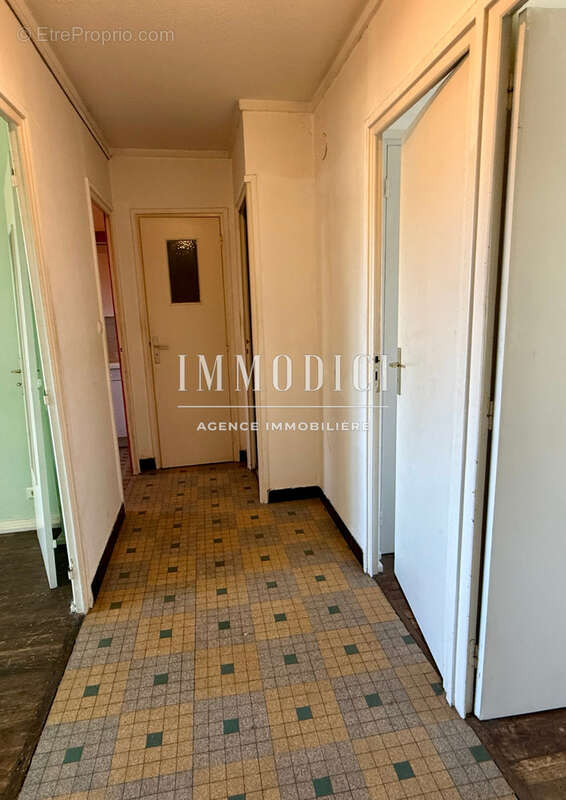 T3 traversant de 52 m2 au cœur du quartier États-Unis - 2ᵉ étage d'une copropriété - photo 4