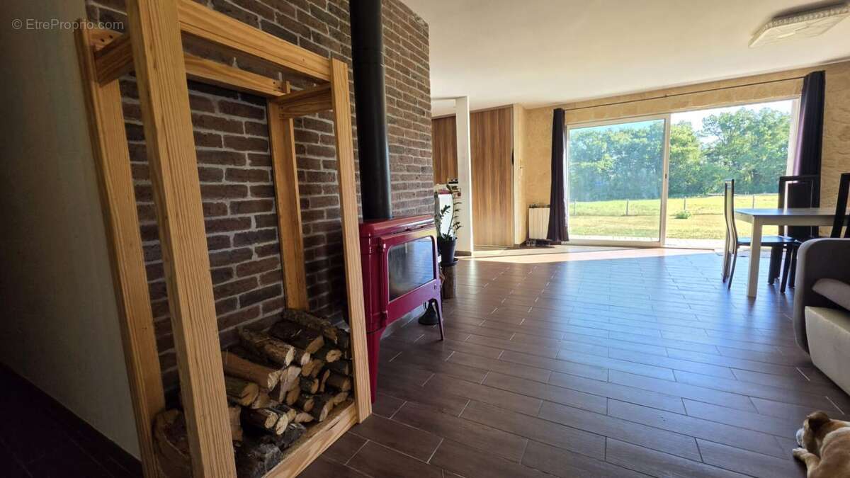 Maison plain pied avec 2 hectares de prairies - photo 4