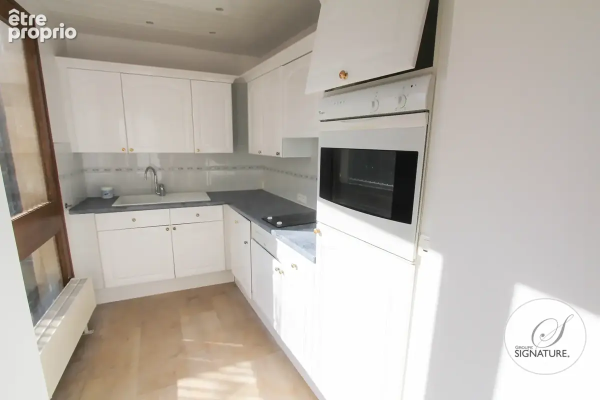 Maison en copropriété avec terrasse et balcon en centre ville - photo 4