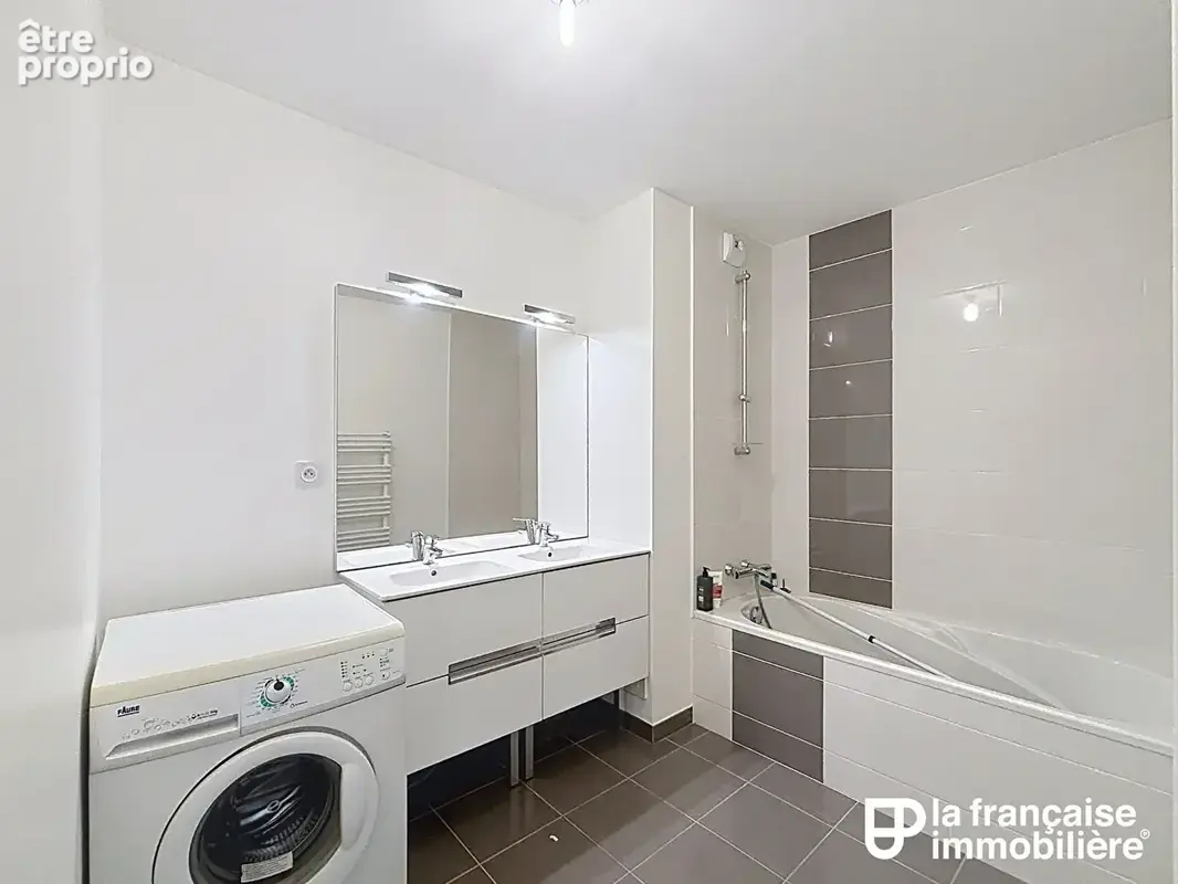 Appartement type 3 - deux chambres - copropriété récente - parking sous-sol -  saint-grégoire - photo 4