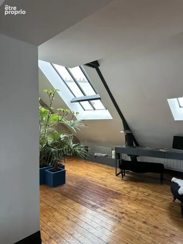 Loft d'exception – 145 m² au sol – Volumes spectaculaires – Charme industriel - photo 3