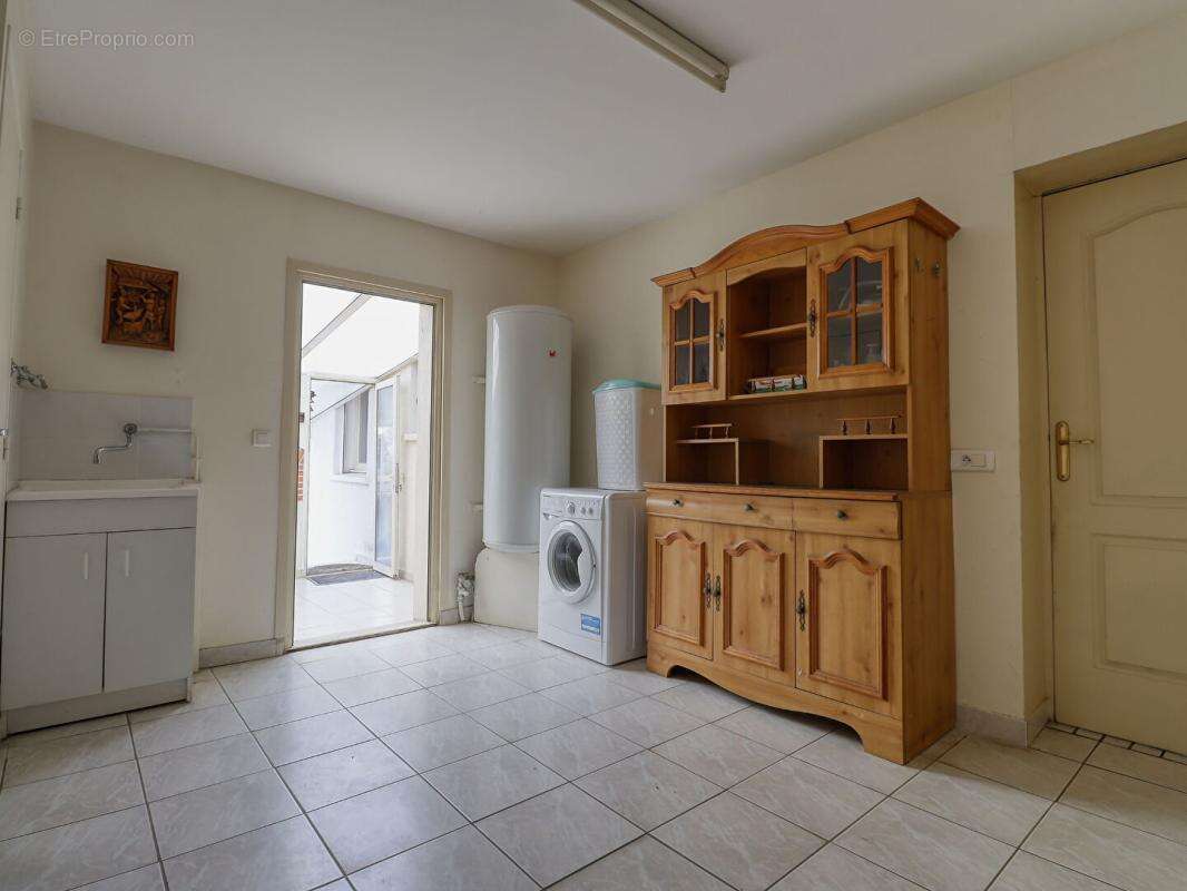 Maison de plain-pied de 110 m² - 3 chambres - Garage - Véranda -Terrain de 682 m² - photo 12
