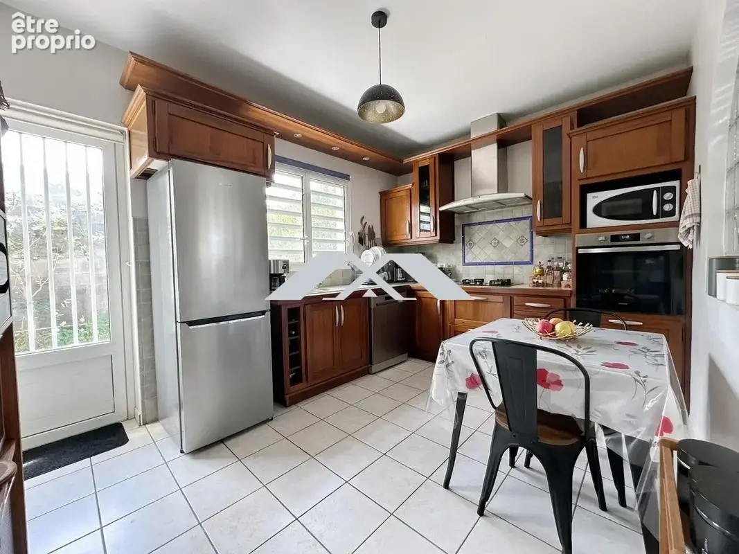 Maison 5 pièces 121 m² à vendre à Saint-Joseph (97480) - photo 4