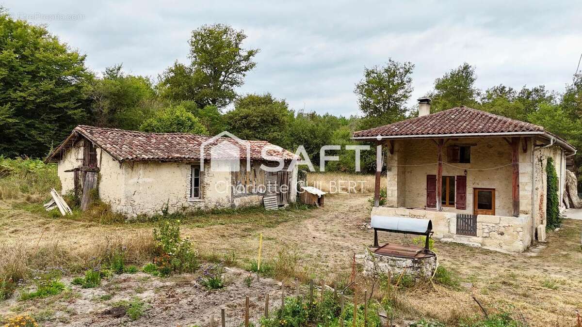 Photo 2 - Maison à BEAUZIAC