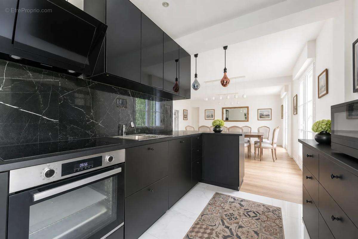 Appartement de 4 pièces de 80 m² situé à Garches - photo 7