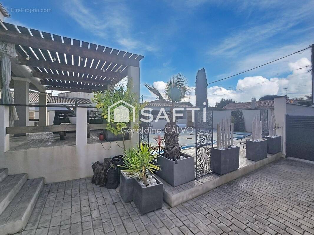 Photo 1 - Maison à COURNONTERRAL