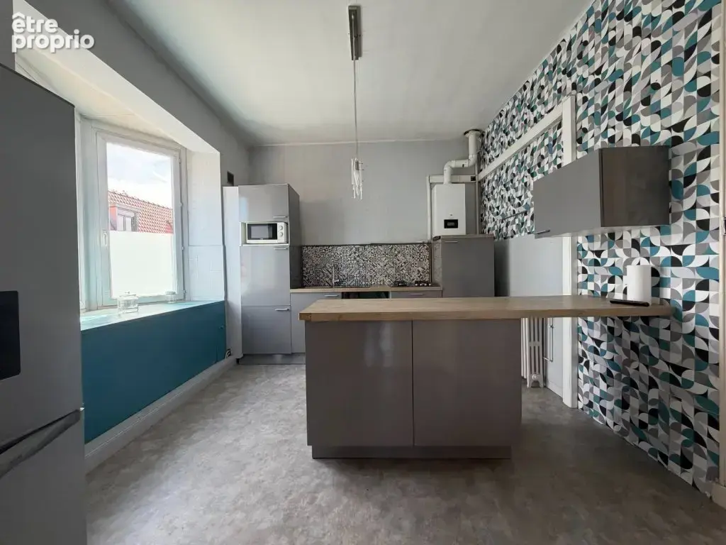 Immeuble de rapport comprenant un local commercial et un appartement - photo 3