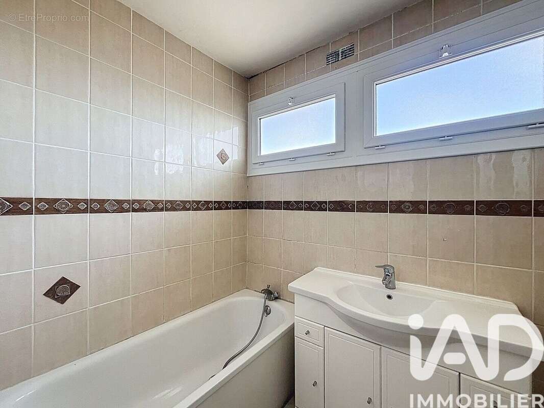 Photo 6 - Appartement à HEROUVILLE-SAINT-CLAIR