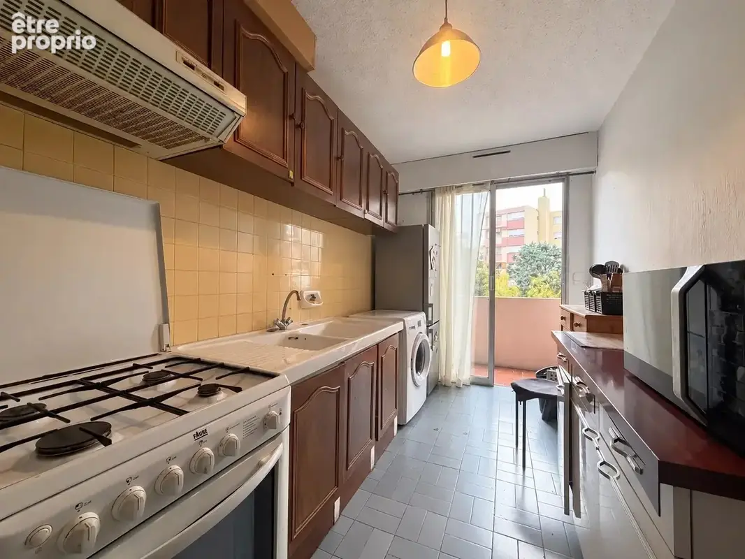 Deux pieces traversant avec terrasse et balcon - photo 7