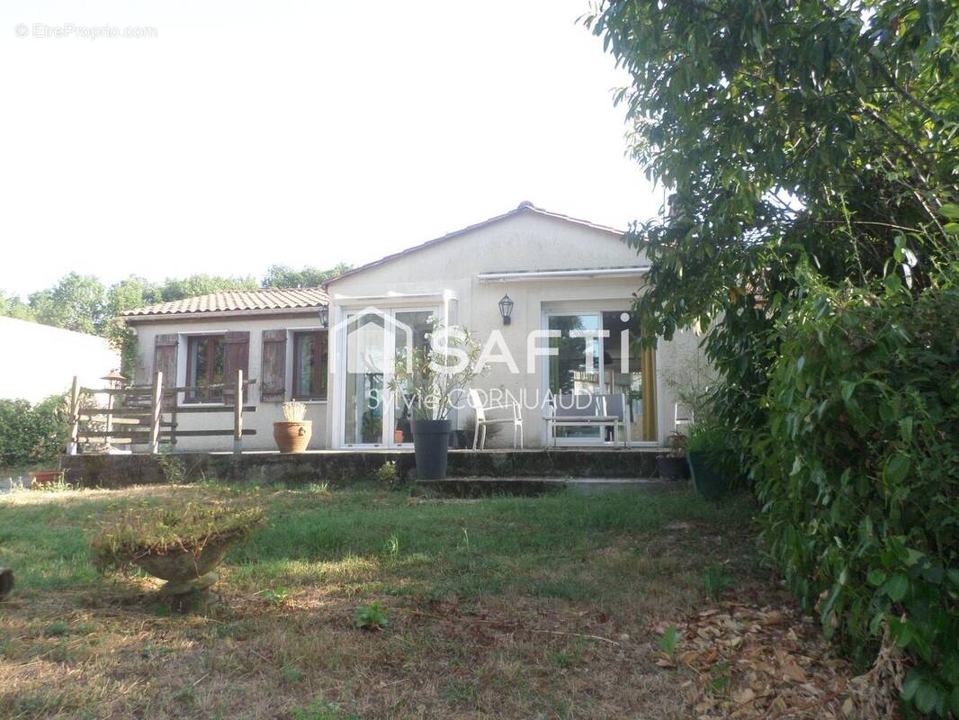 Photo 1 - Maison à LA CHAPELLE-DES-POTS