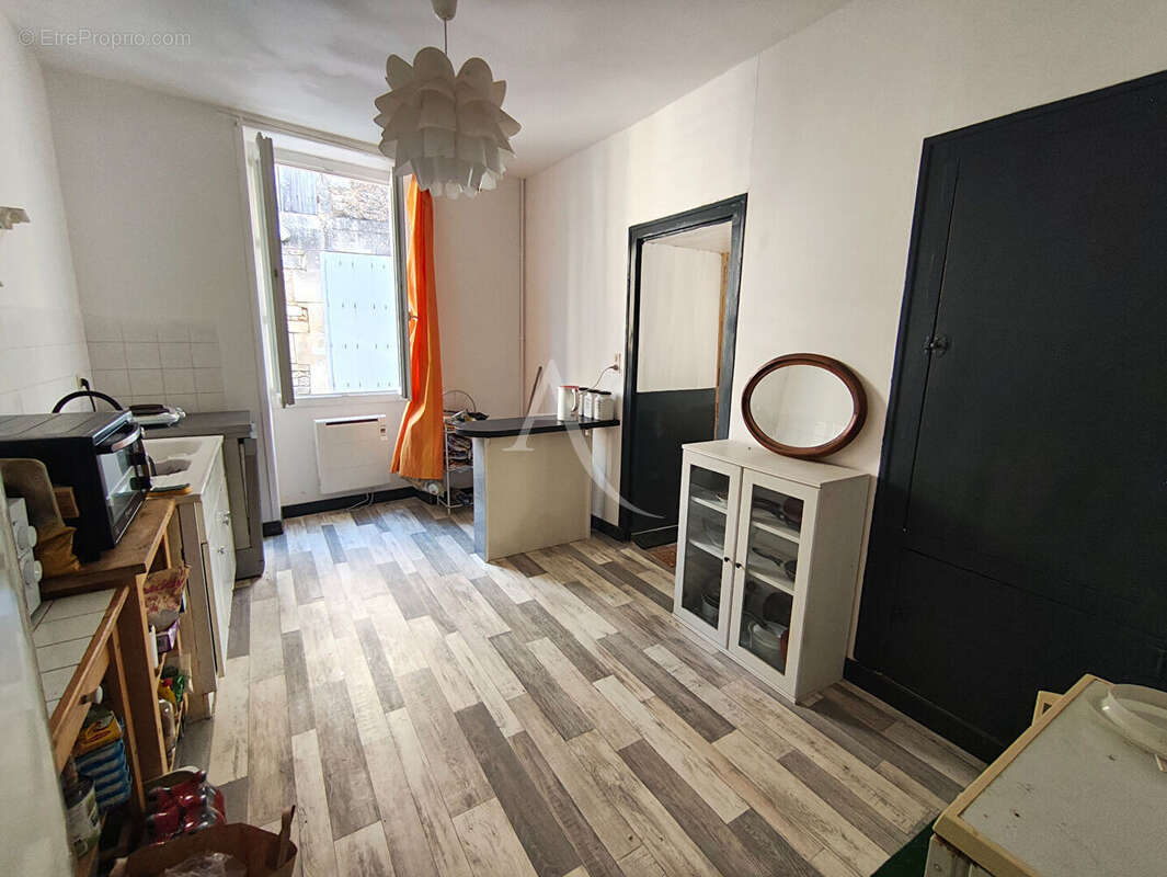 Maison coeur de ville avec potentiel - photo 5