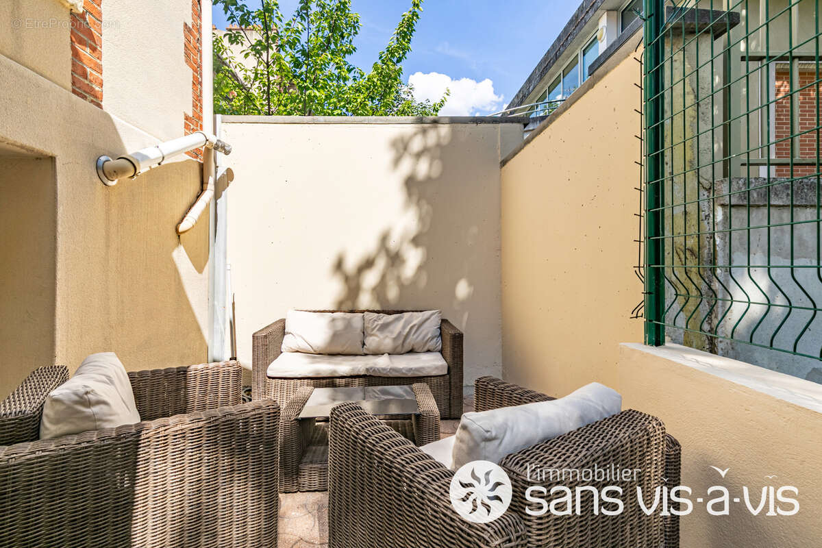 Maison à COURBEVOIE