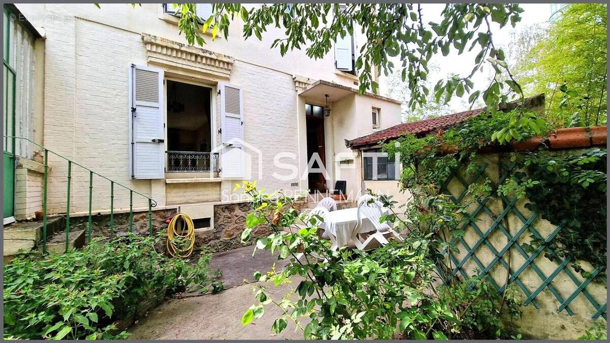 Photo 1 - Appartement à COURBEVOIE