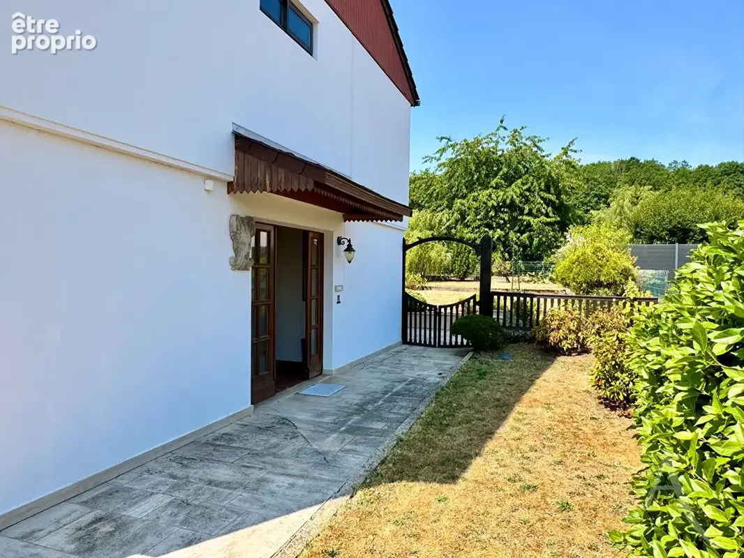 Pavillon individuel en lisière de forêt avec garage et jardin - photo 4