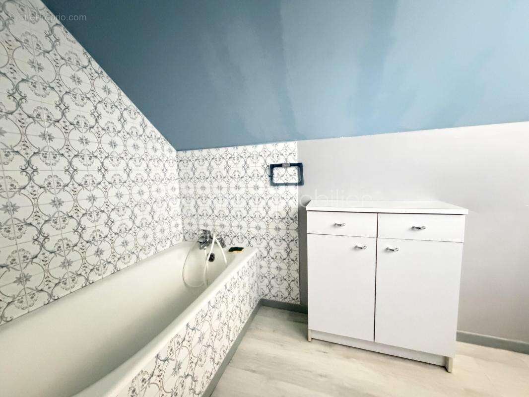 Maison familiale de 136 m² avec sous-sol complet et dépendances - photo 14