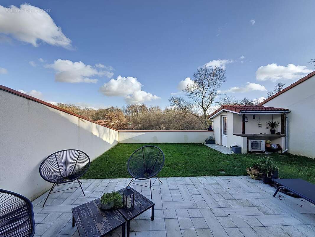 Photo 2 - Maison à BOUGUENAIS