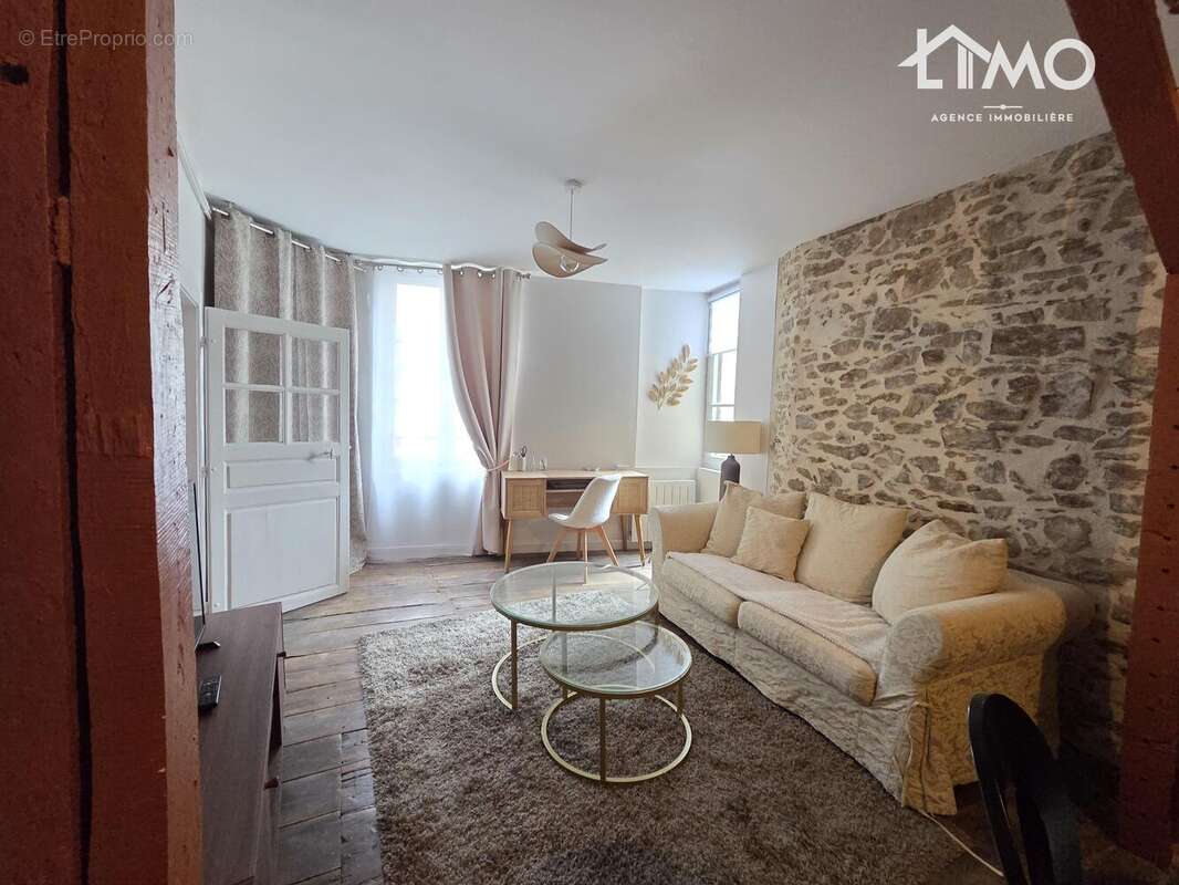 n°1 - Appartement à SAINT-LEONARD-DE-NOBLAT