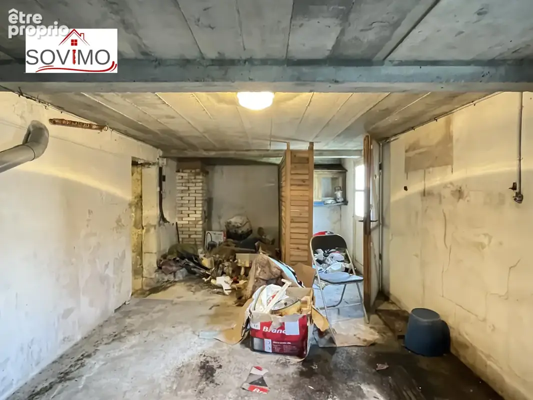 Maison de ville à rénover : jardin, garage et beau potentiel - photo 31