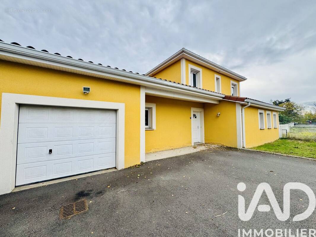 Photo 1 - Maison à ANDREZIEUX-BOUTHEON