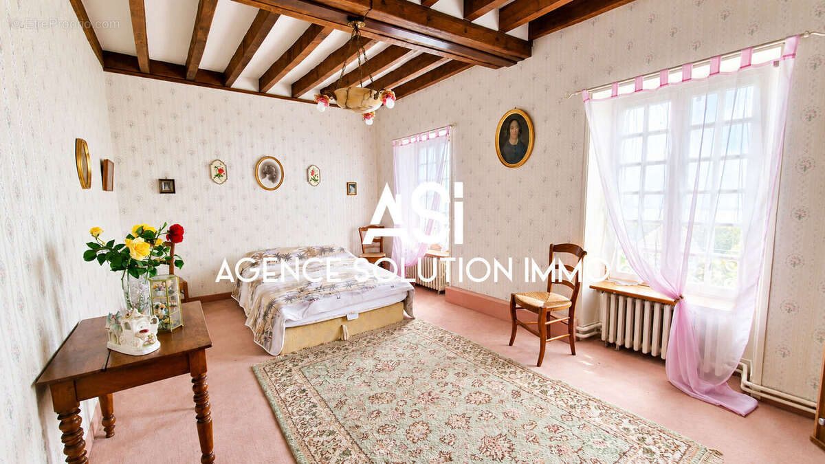 Maison à LOUVIGNE