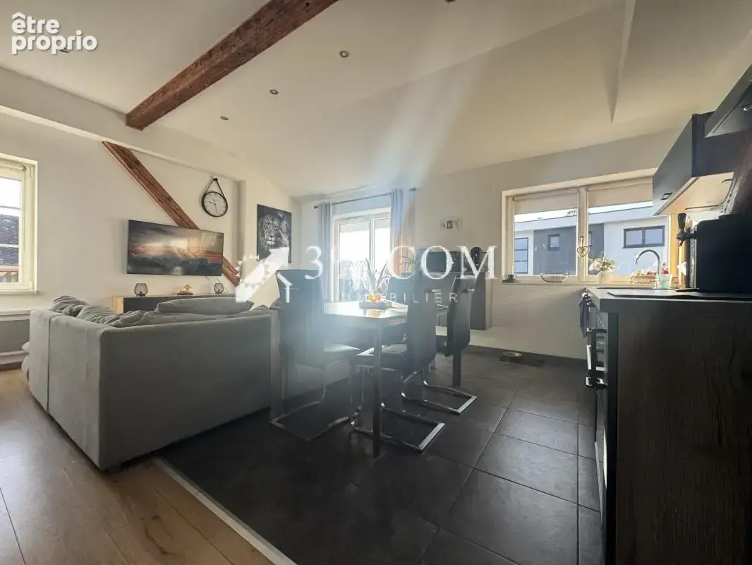 3%COM Très beau F2 avec terrasse - cave - photo 11