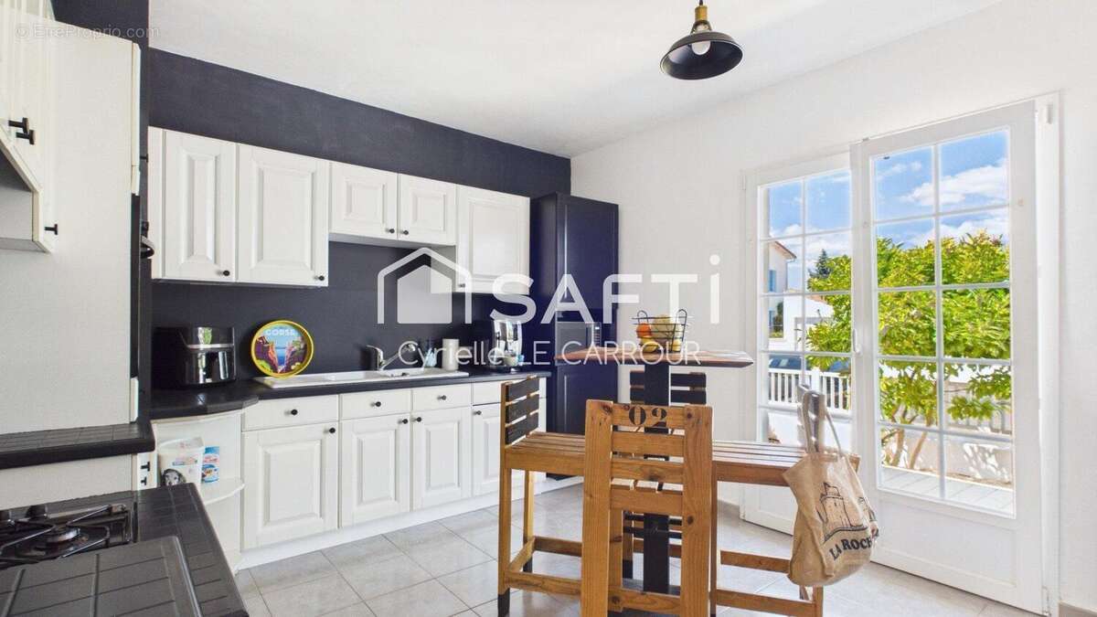 Maison 149 m² à Saint-Xandre  - photo 5
