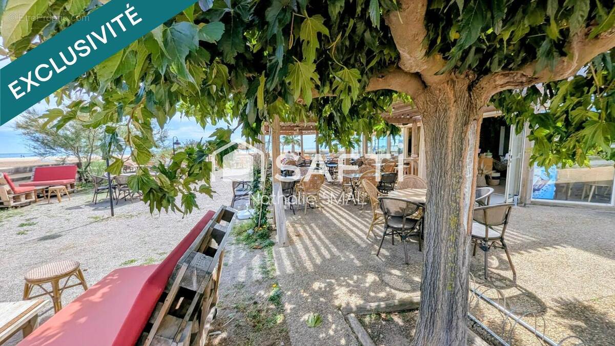 Photo 1 - Commerce à FLEURY