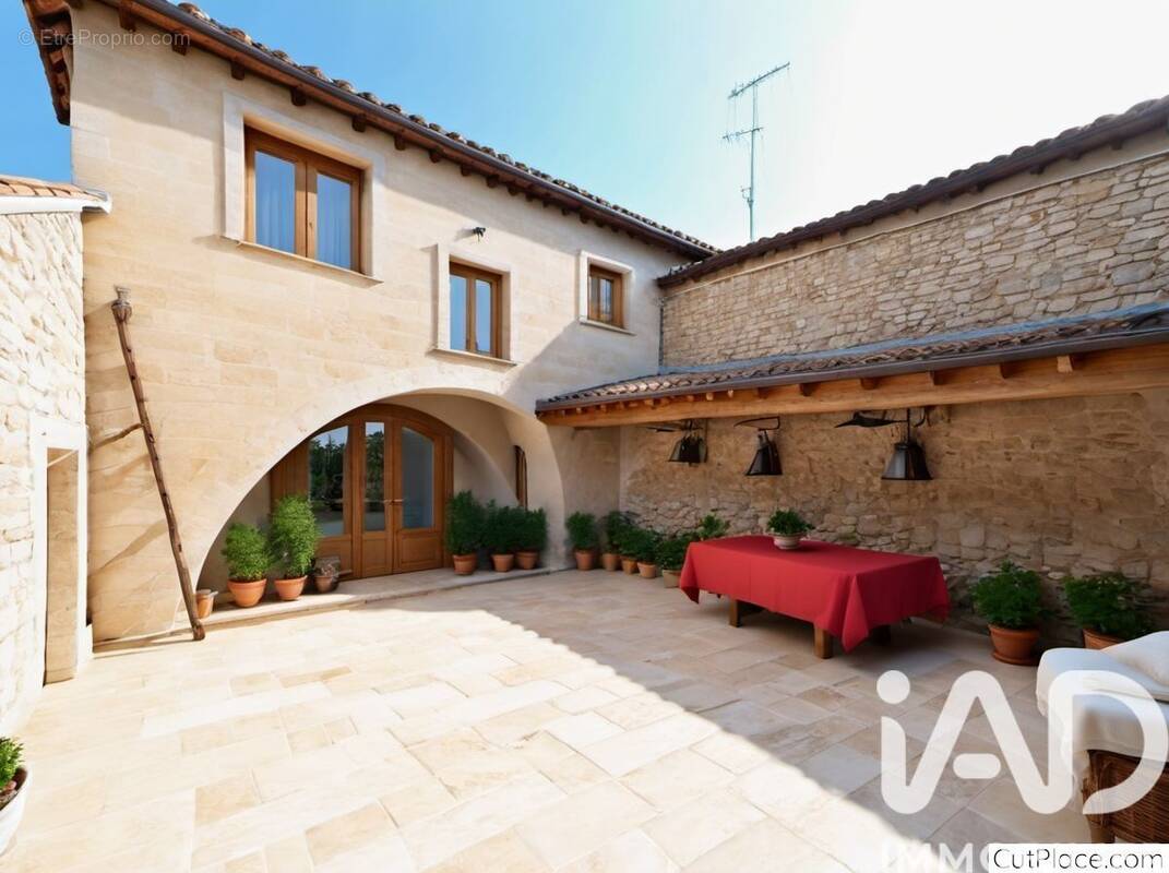 Photo 1 - Maison à JONQUIERES-SAINT-VINCENT