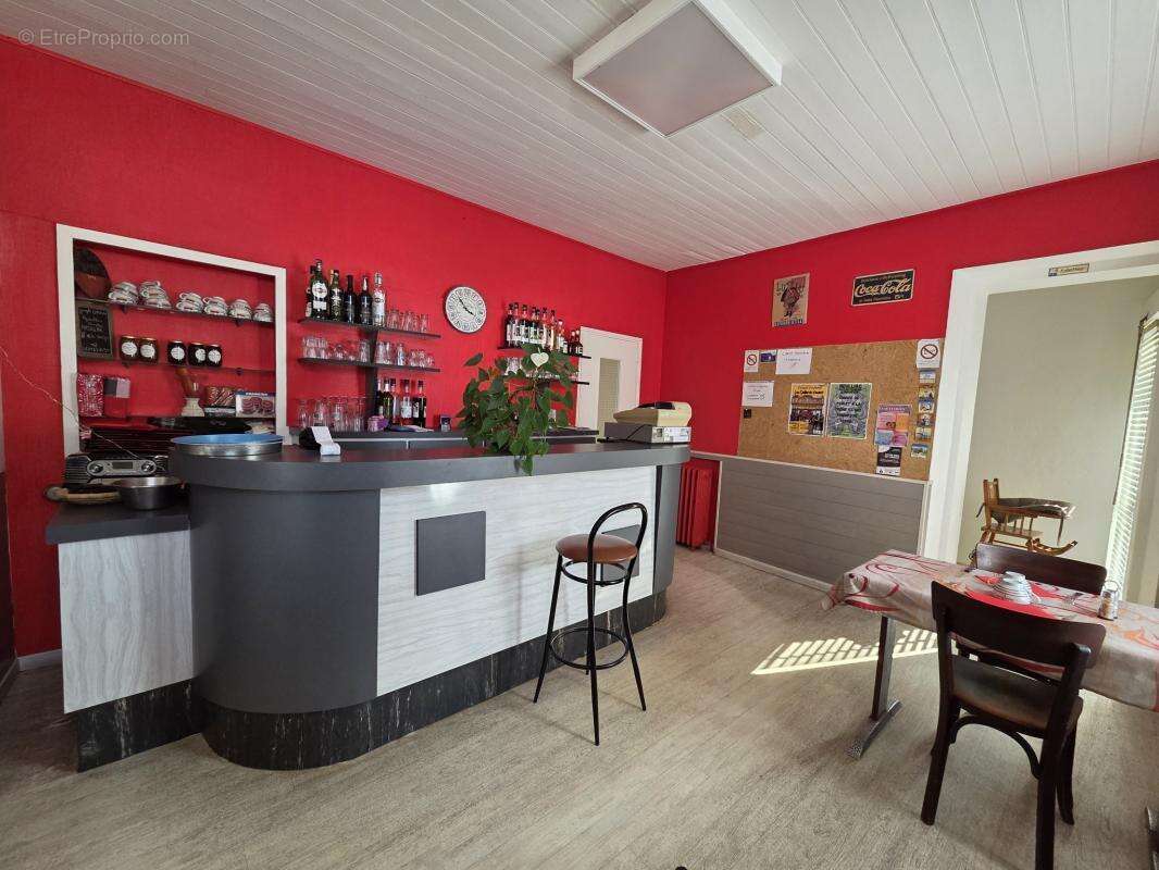 Ensemble immobilier 3 logements-parking- centre bourg neulli - photo 3