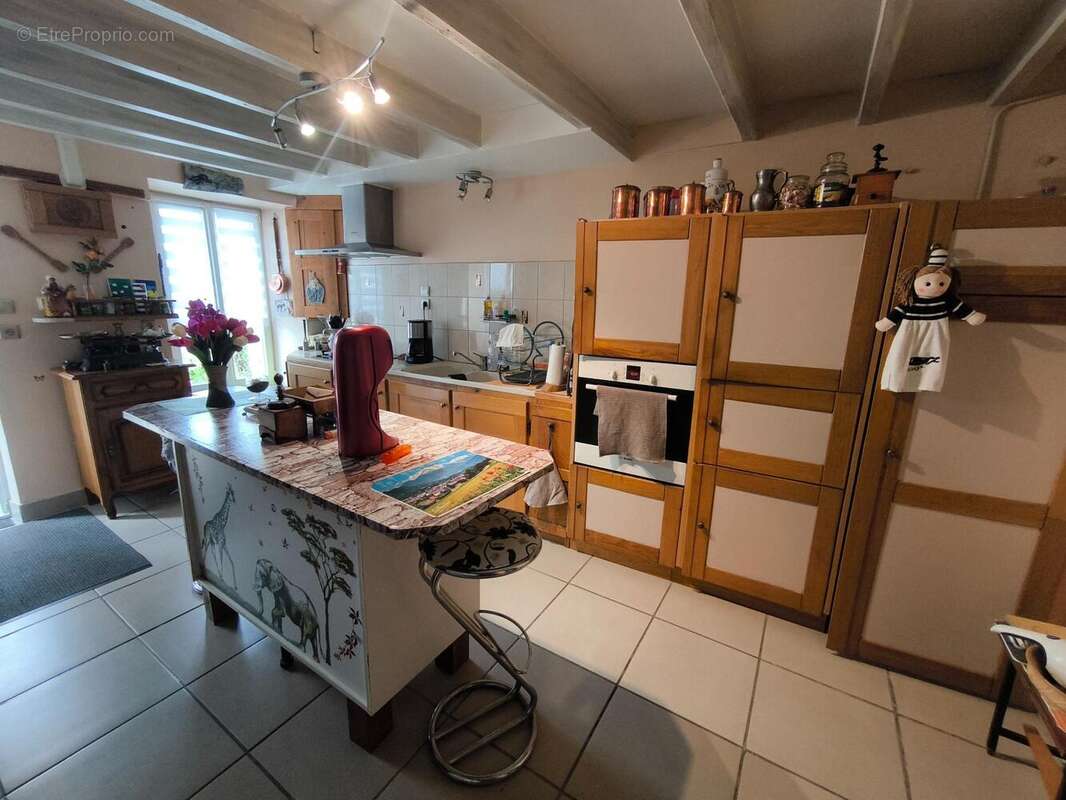 Maison 92 m² à Migre  - photo 4
