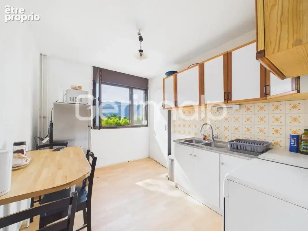 Vente - Appartement - 2 pièces + cuisine - 50,47 m² - 230 000 € - photo 3