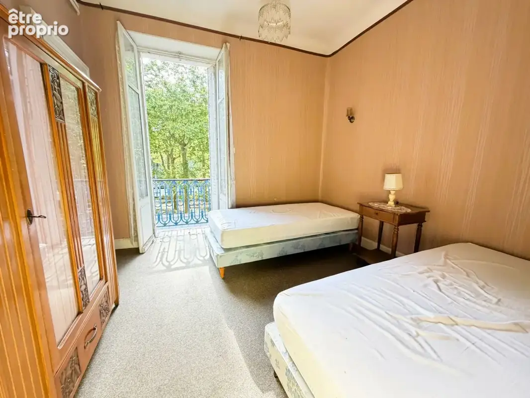 APPARTEMENT T3 traversant 92 m2 face aux parcs - photo 7