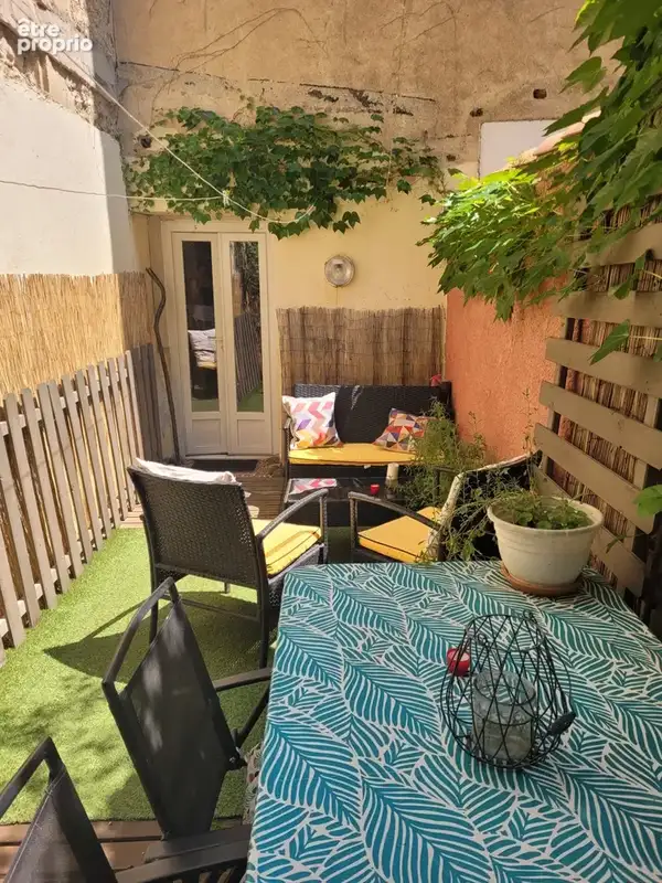 Charmant appartement de caractère avec cour et sa cuisine d'été. - photo 4