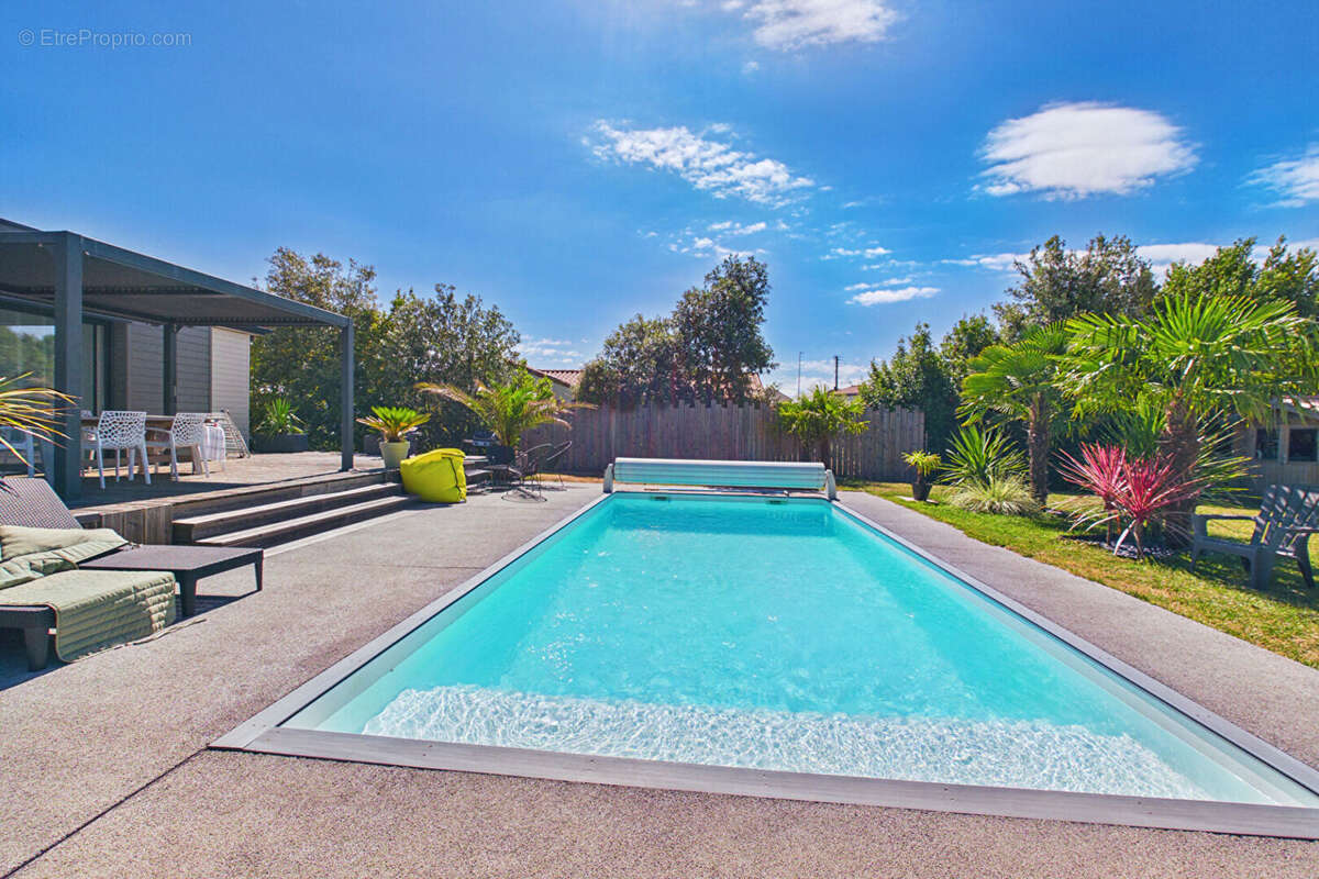 Maison de plain-pied de 2021 - 3ch et 1 bureau + studio - piscine - photo 3