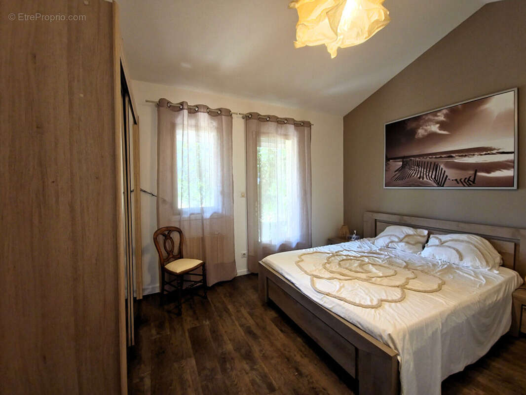 Maison familiale avec 3 chambres et jardin intimiste, proche commerces à Lavernose-Lacasse - photo 11