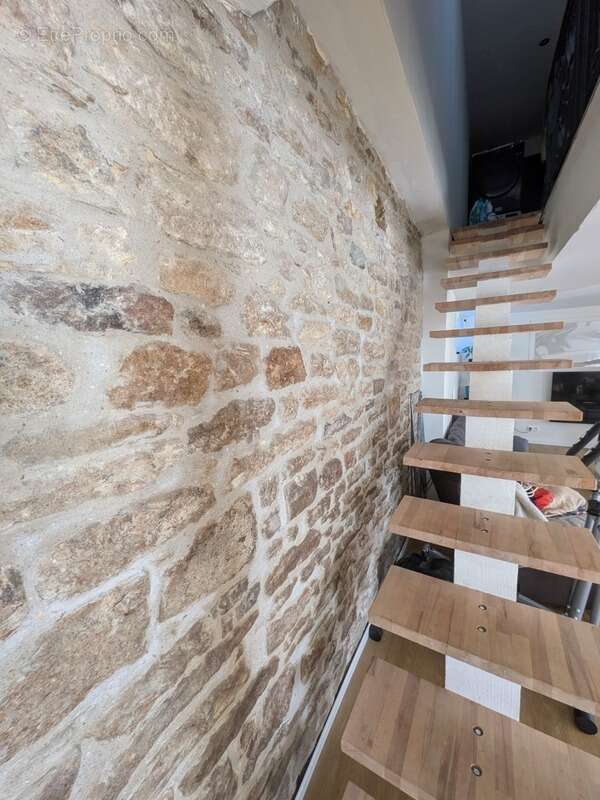 Séglien en campagne longère en pierre rénovée avec vie de plain pied de 243m², garage, atelier et dépendance parcelle de 7125m² - photo 11