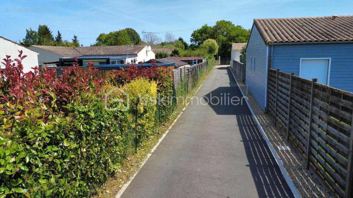 Maison ossature bois 165 m² Jardin 2000m2 clos– DPE B/A – 4 chambres + bureau – Piscine – Climatisation - photo 3