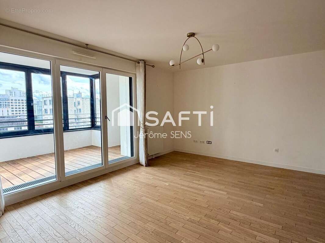 Photo 2 - Appartement à COURBEVOIE