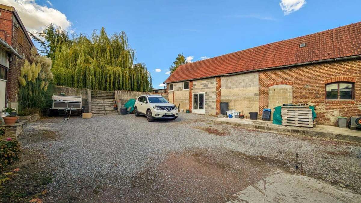 Maison à GOUZEAUCOURT