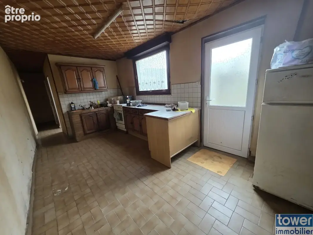 Maison à rénover de 97,8 m2 avec grand garage de 46 m2 et cour : un beau potentiel à saisir ! - photo 8