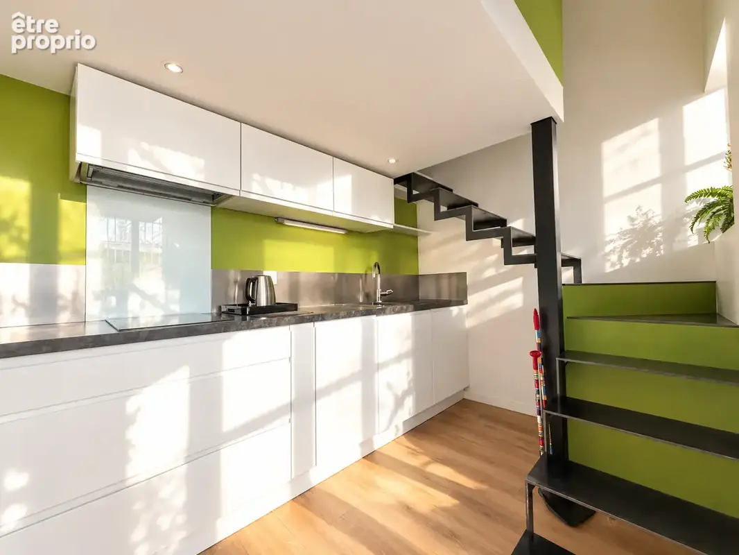 Appartement traversant de 37 m2 avec mezzanine de 15 m2   RDC   Rue Émile Lepeu - photo 3