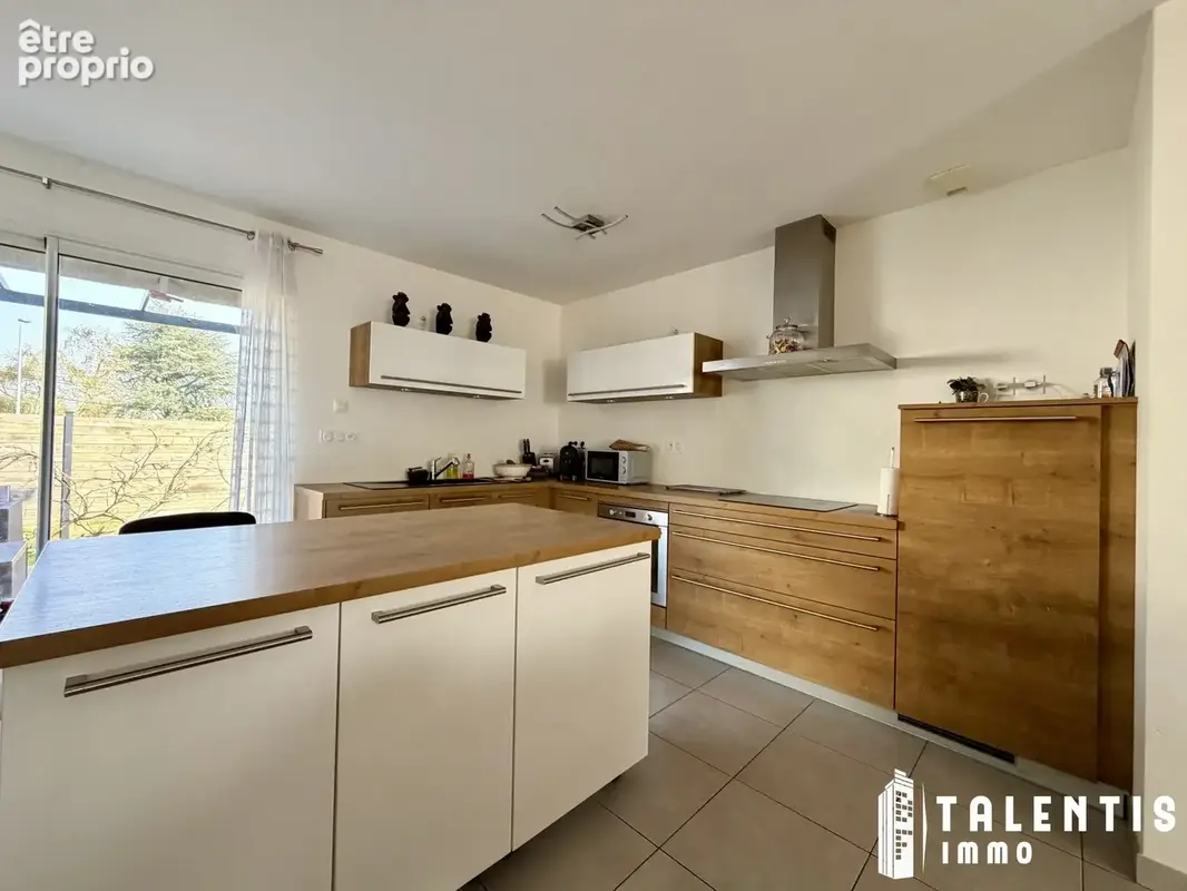 Maison 4 pièces 94 m² à vendre à Treillieres (44119) - photo 4