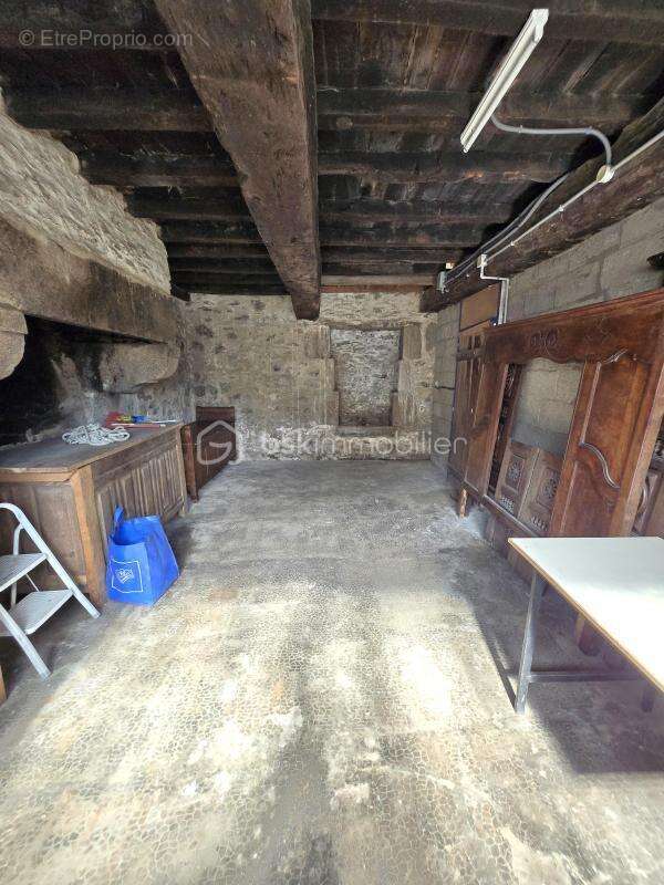 À Dinan, dans le secteur recherché de Léhon, maison de ville en pierre avec garage et courette - photo 16