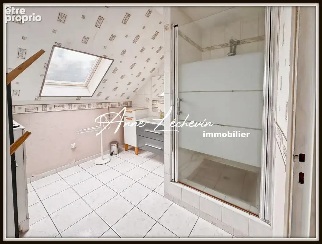 Maison individuelle de 198 m² – semi-plain-pied – sous-sol complet – beaux volumes - photo 14