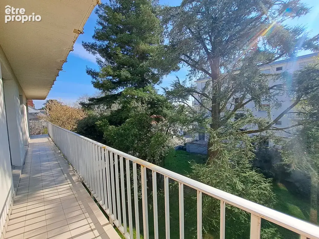 Spacieux appartement T4 de 100,97 m² avec balcon, cave et parking - photo 12