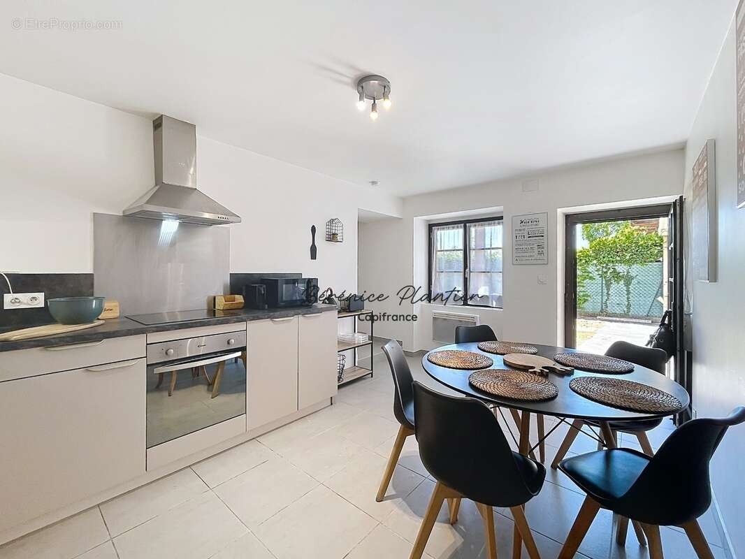 Appartement T3 en Rez-de-jardin  CRANVES SALES (74) - photo 2