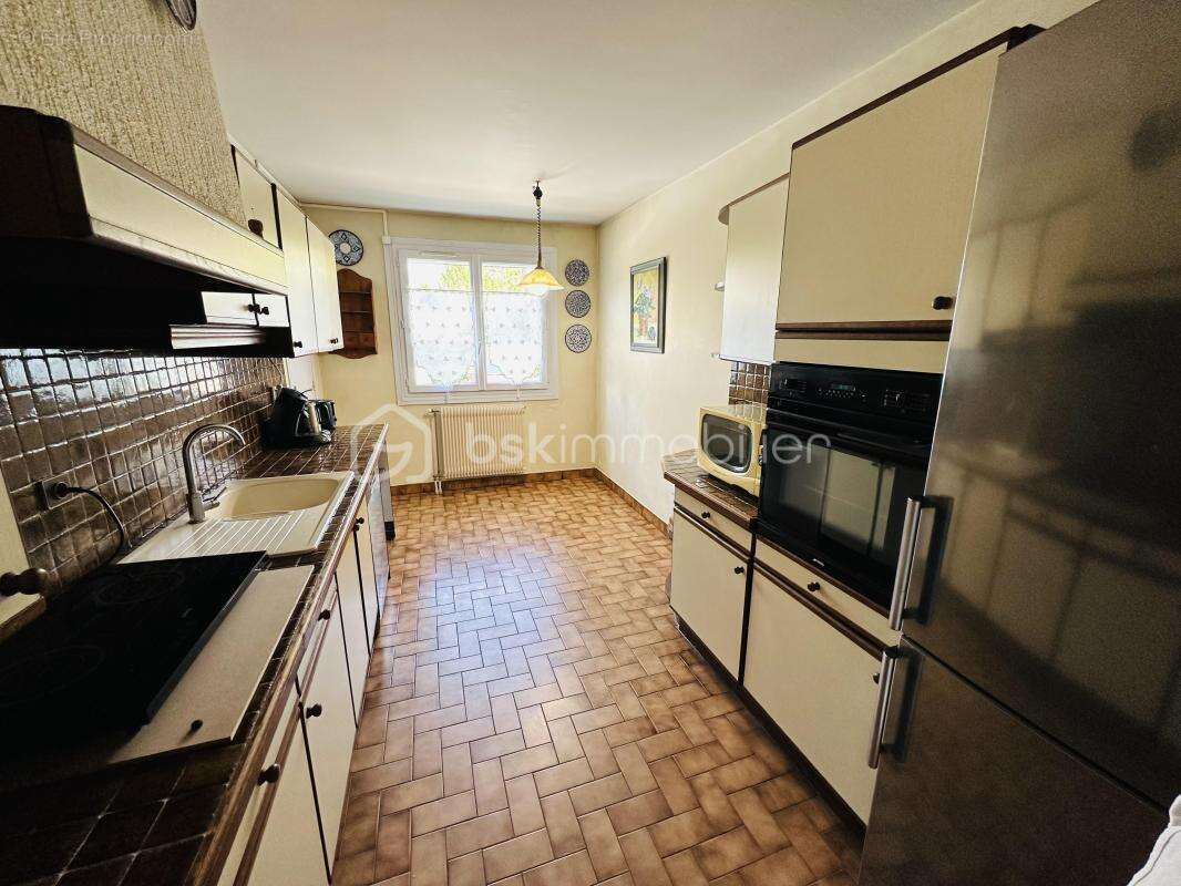 Appartement en rez de jardin avec garage + place de parking privative - photo 5