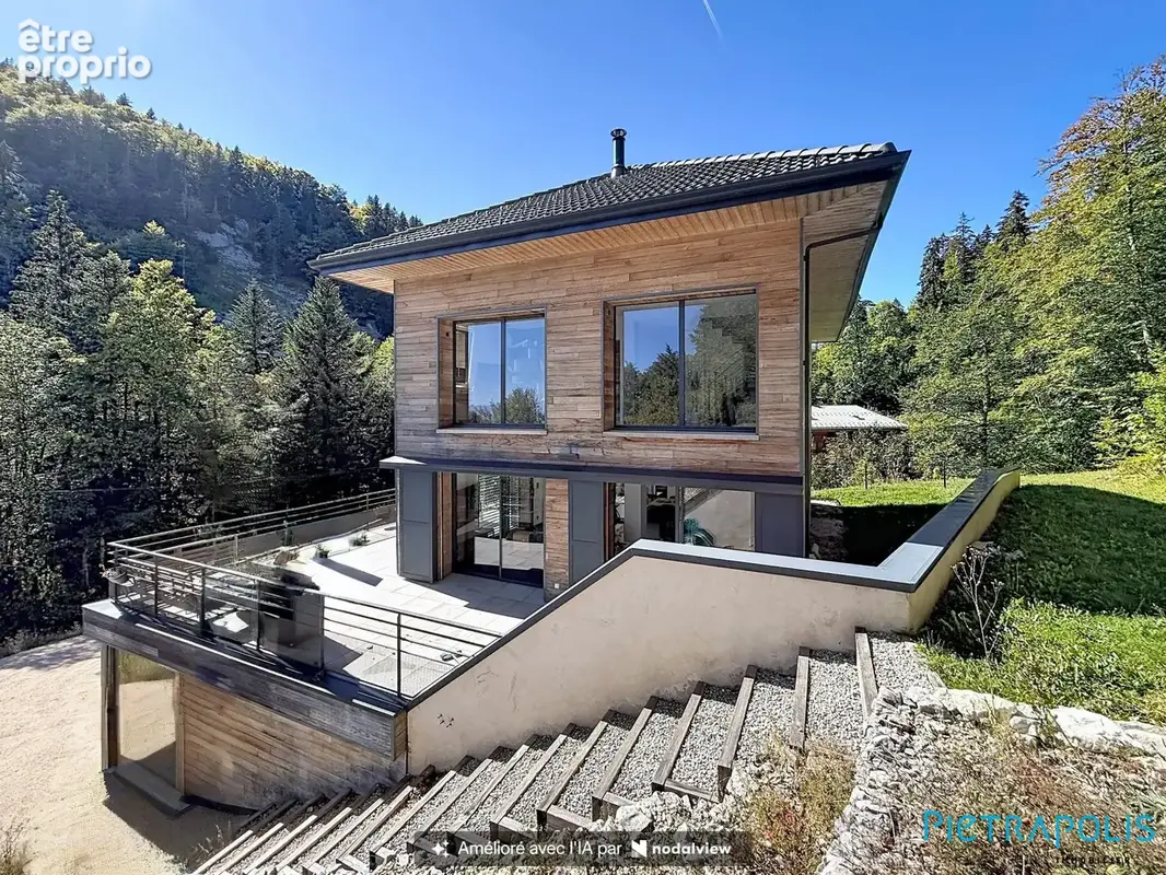 Maison 7 pièces 230 m² à vendre à Mijoux (01170) - photo 6