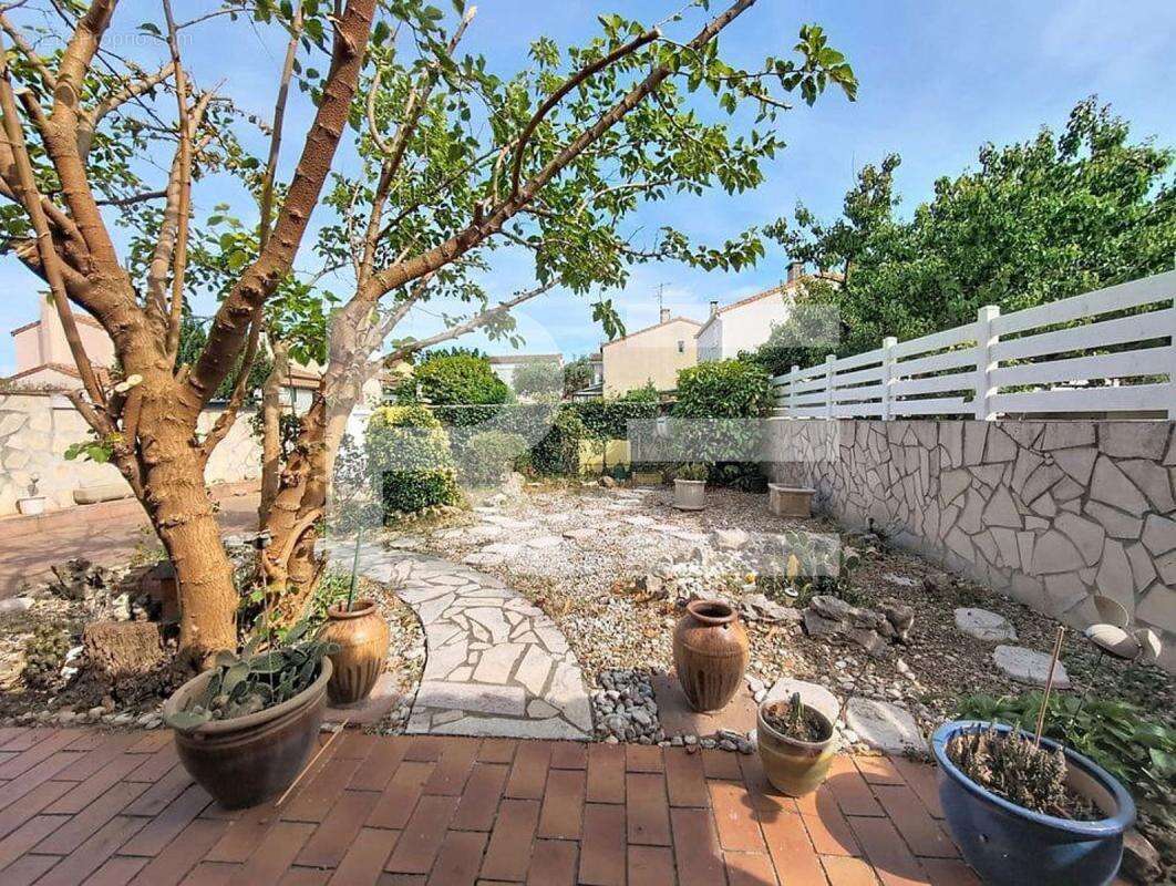 Maison 4 chambres avec jardin et garage à Caissargues - photo 2